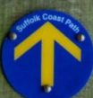 Suffolk Coast Path blue and yellow waymarker disc